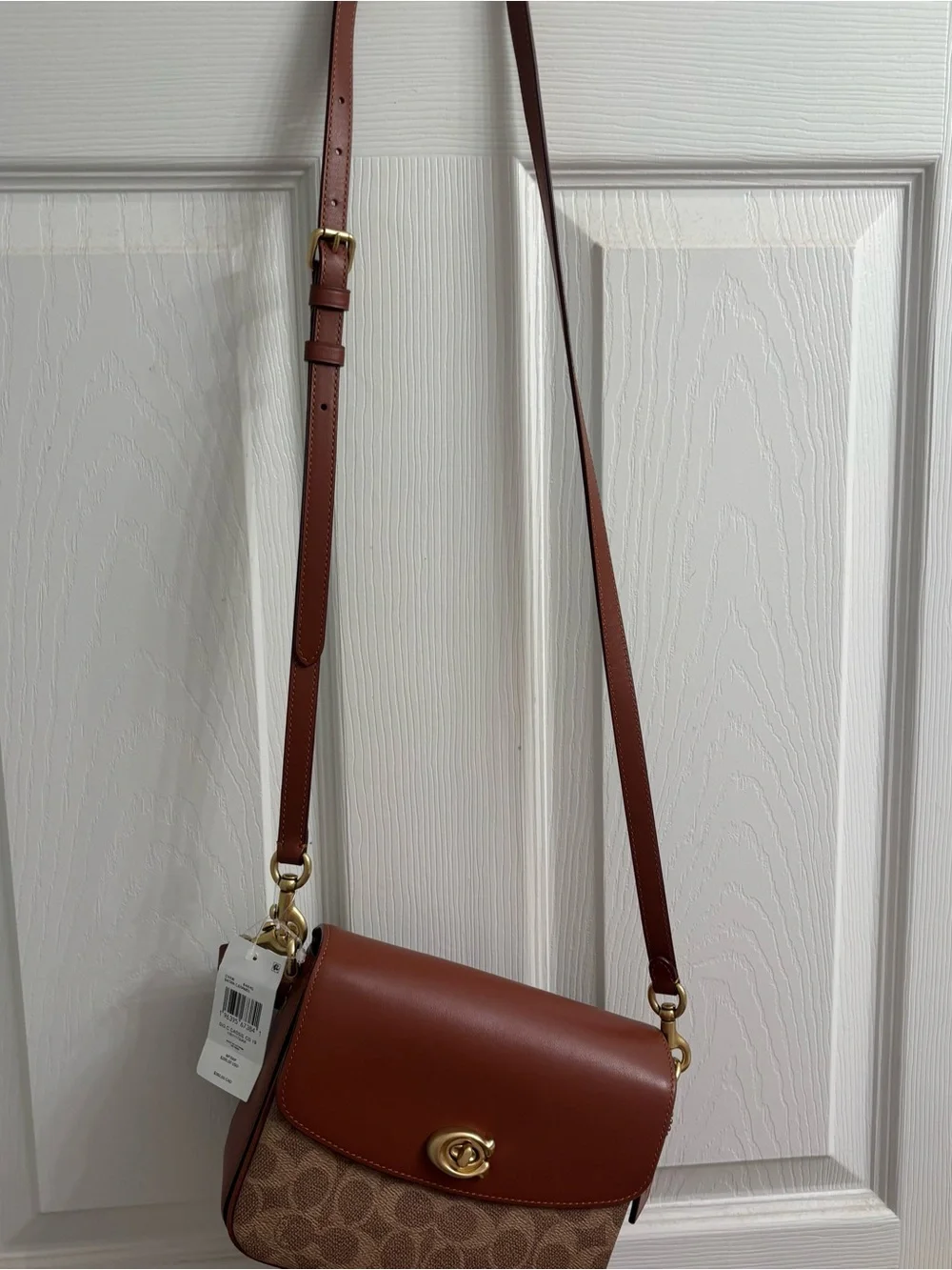 Coach Cassie Signature Canvas and Leather Saddle Bag in Brown